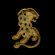 Gold-tone blue crystal-style lion statement brooch back pin detail