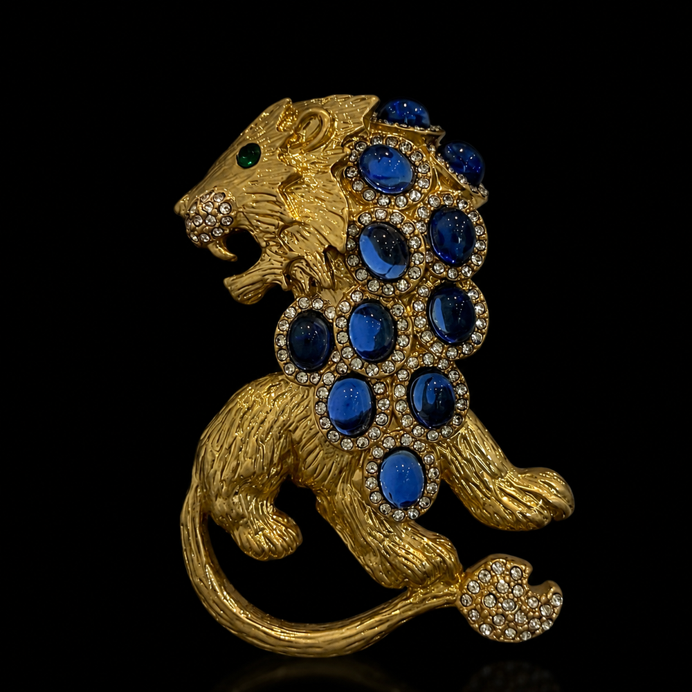 Gold-tone blue crystal-style lion statement brooch