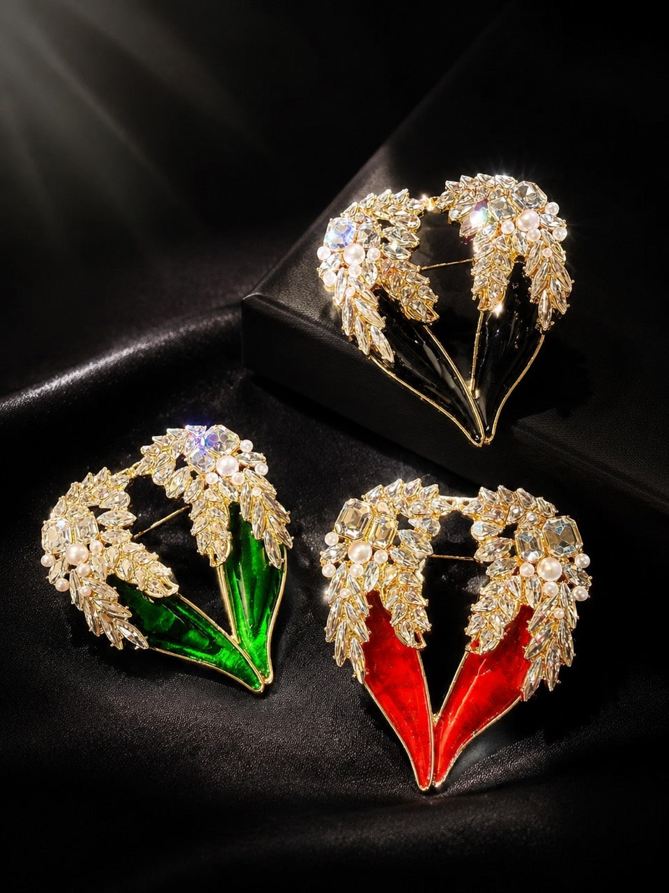 Gold-tone crystal-style winged heart statement brooch red green black color group