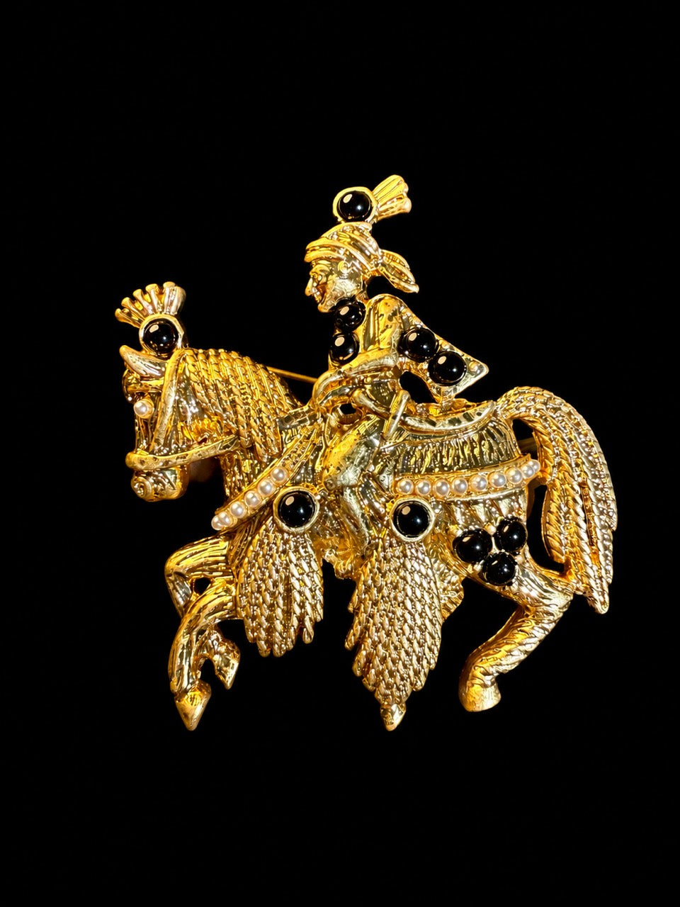 Gold-tone equestrian rider statement brooch black accent front view