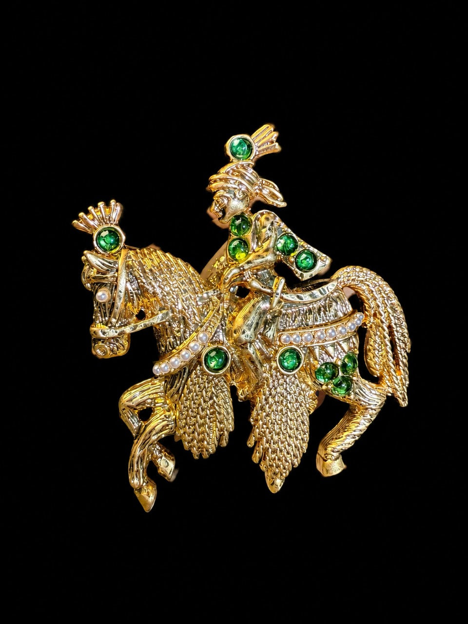 Gold-tone equestrian rider statement brooch green accent front view