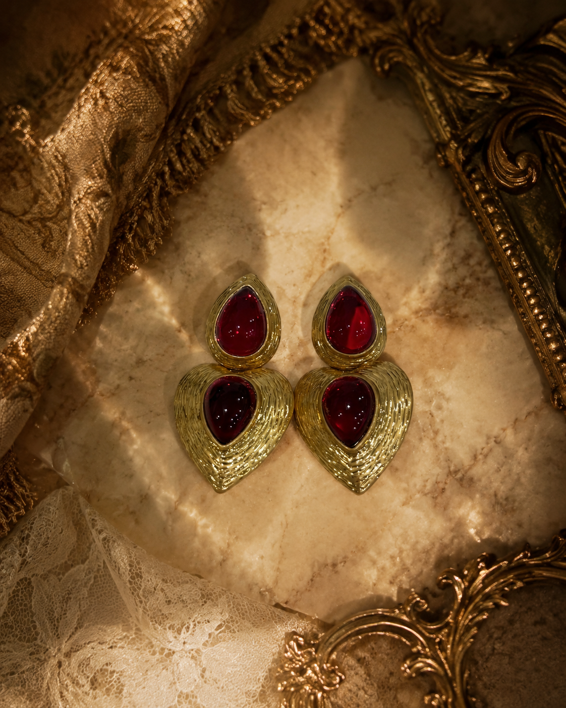 Red gold-tone glass heart drop stud earrings detail view