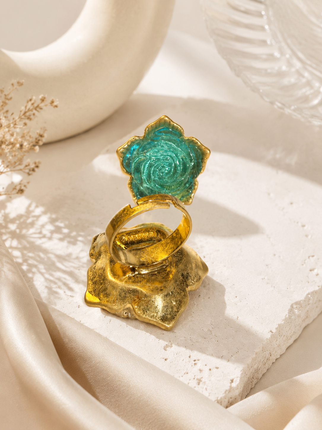 Gold-tone sky blue glass rose adjustable ring back detail
