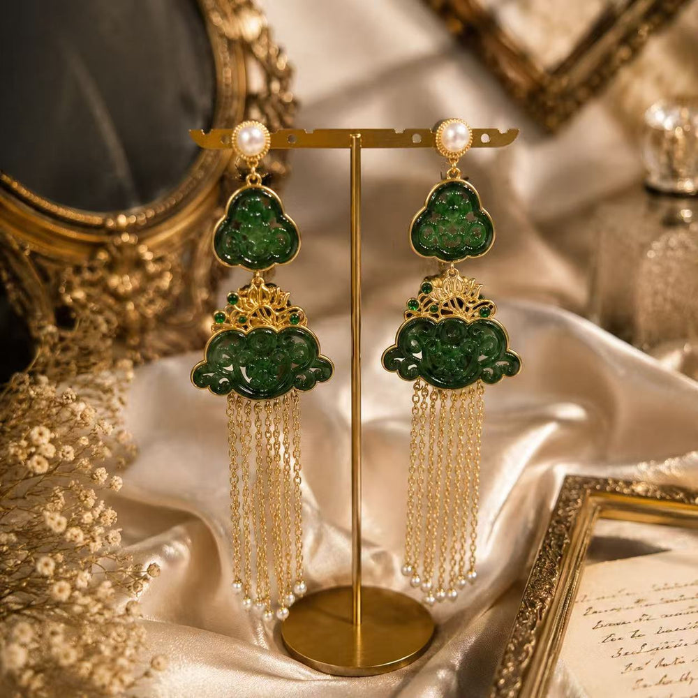 Gold-tone green carved-style chain tassel drop stud earrings front view