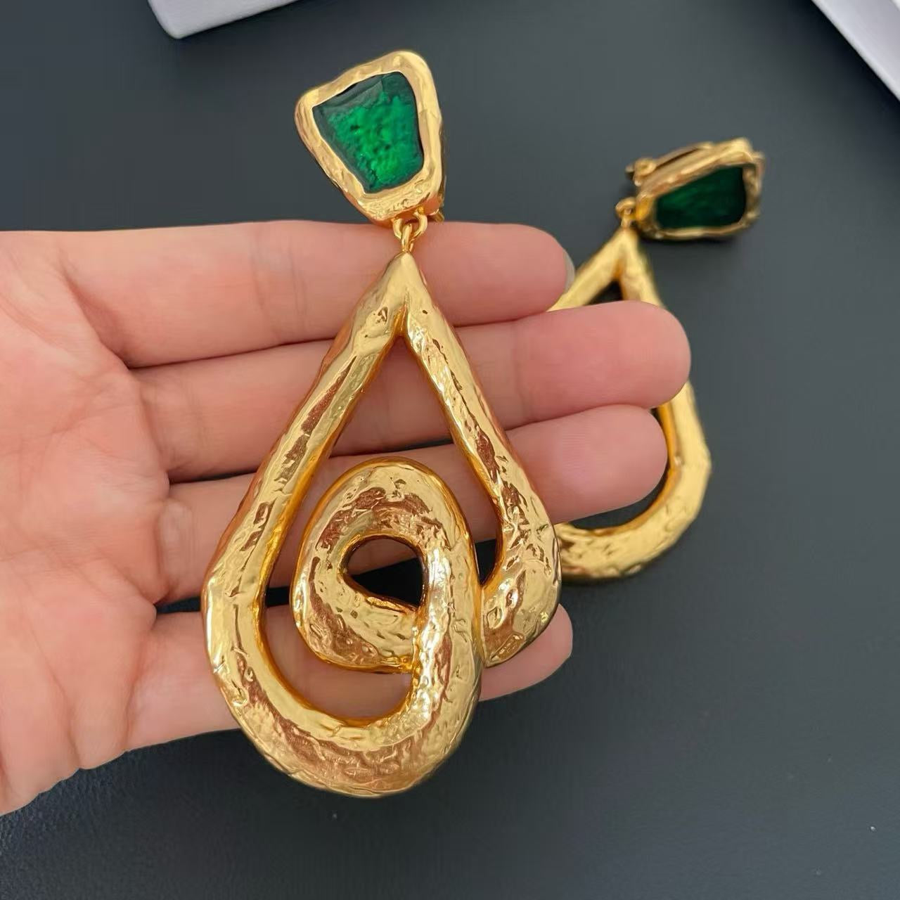 Gold-tone green stone-style clip-on statement earring detail