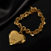 Gold-tone heart pendant necklace with geometric chain links