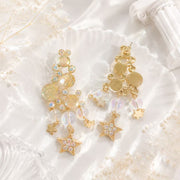 Gold-tone iridescent star tassel drop stud earrings front and back view