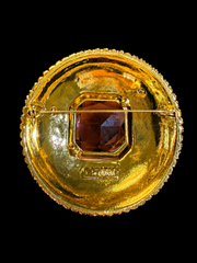 Gold-tone large glass crystal-style statement brooch back view with pin closure
