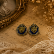 Blue stone-style gold-tone lion head crystal-style stud earrings