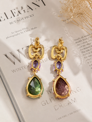 Gold-tone multicolor crystal-style drop stud earrings detail view