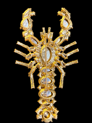 Gold-tone multicolor crystal-style lobster brooch back view with pin closure