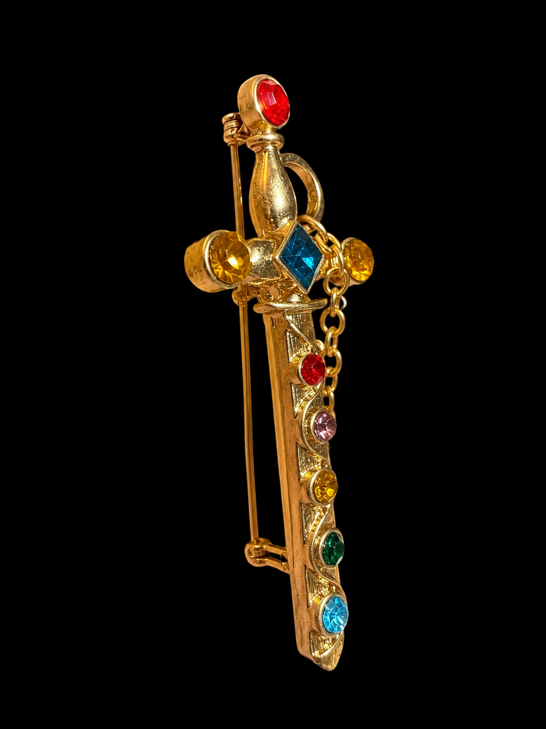 Gold-tone multicolor crystal-style sword mini brooch side view with pin clasp