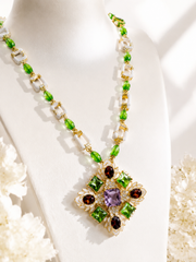 Gold-tone multicolor enamel-style convertible brooch pendant necklace close view