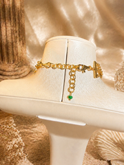 Gold-tone necklace adjustable back chain and clasp detail