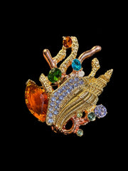Gold-tone multicolor rhinestone seashell statement brooch front view