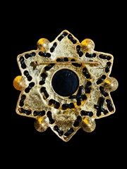 Gold-tone multicolor stone-style star statement brooch back view with pin closure