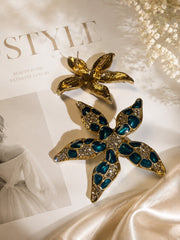 Gold-tone Ocean Teal crystal-style starfish stud earrings front and back detail