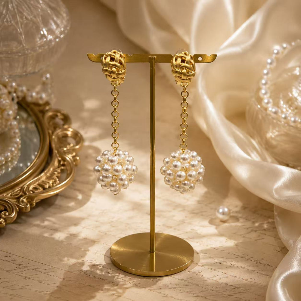 Gold-tone pearl-style cluster drop clip-on earrings display view