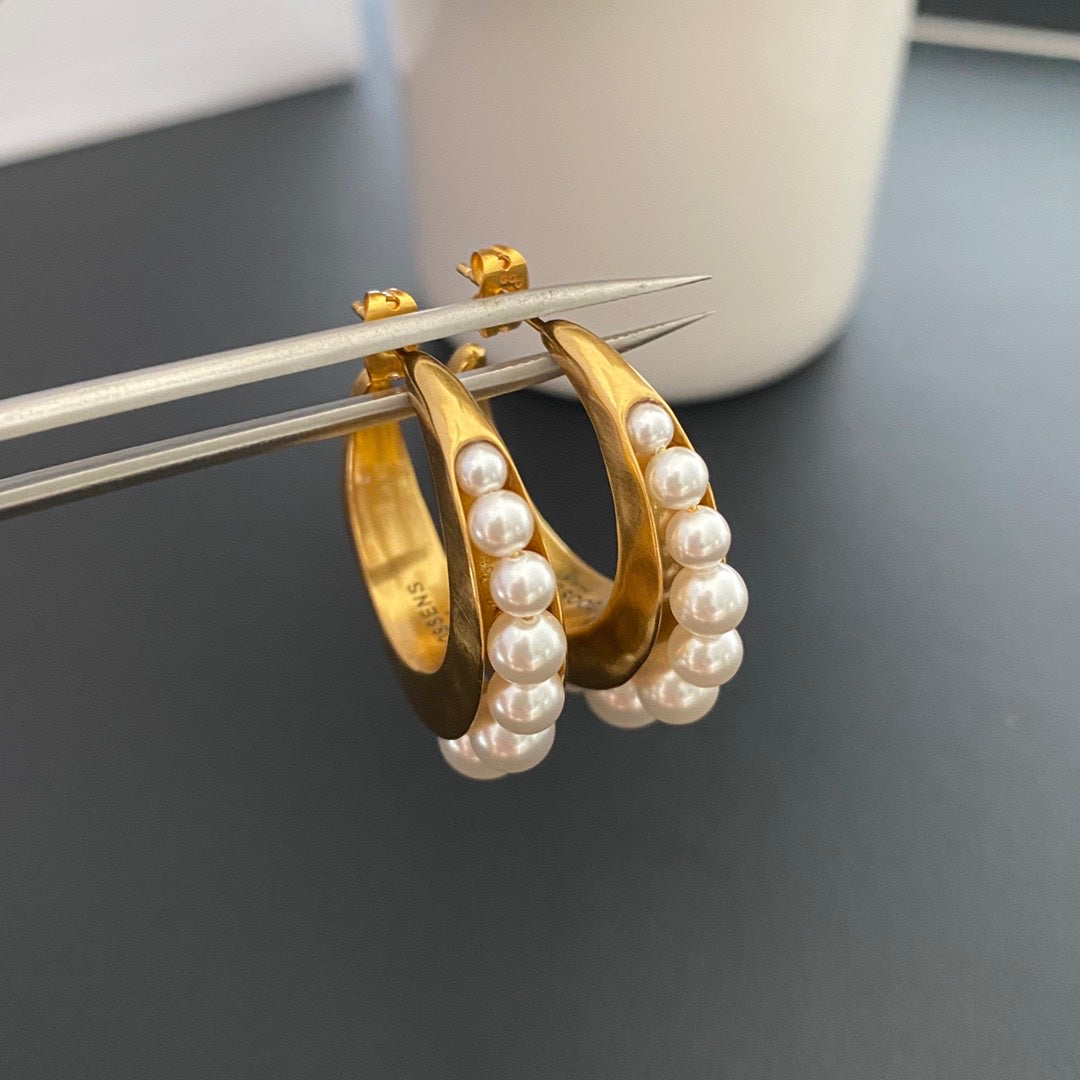 Gold-tone pearl-style crescent hoop stud earrings back detail