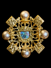 Gold-tone pearl-style iridescent cabochon statement brooch back view with pin closure