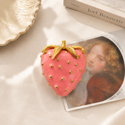 Gold-tone pink enamel-style strawberry brooch front view