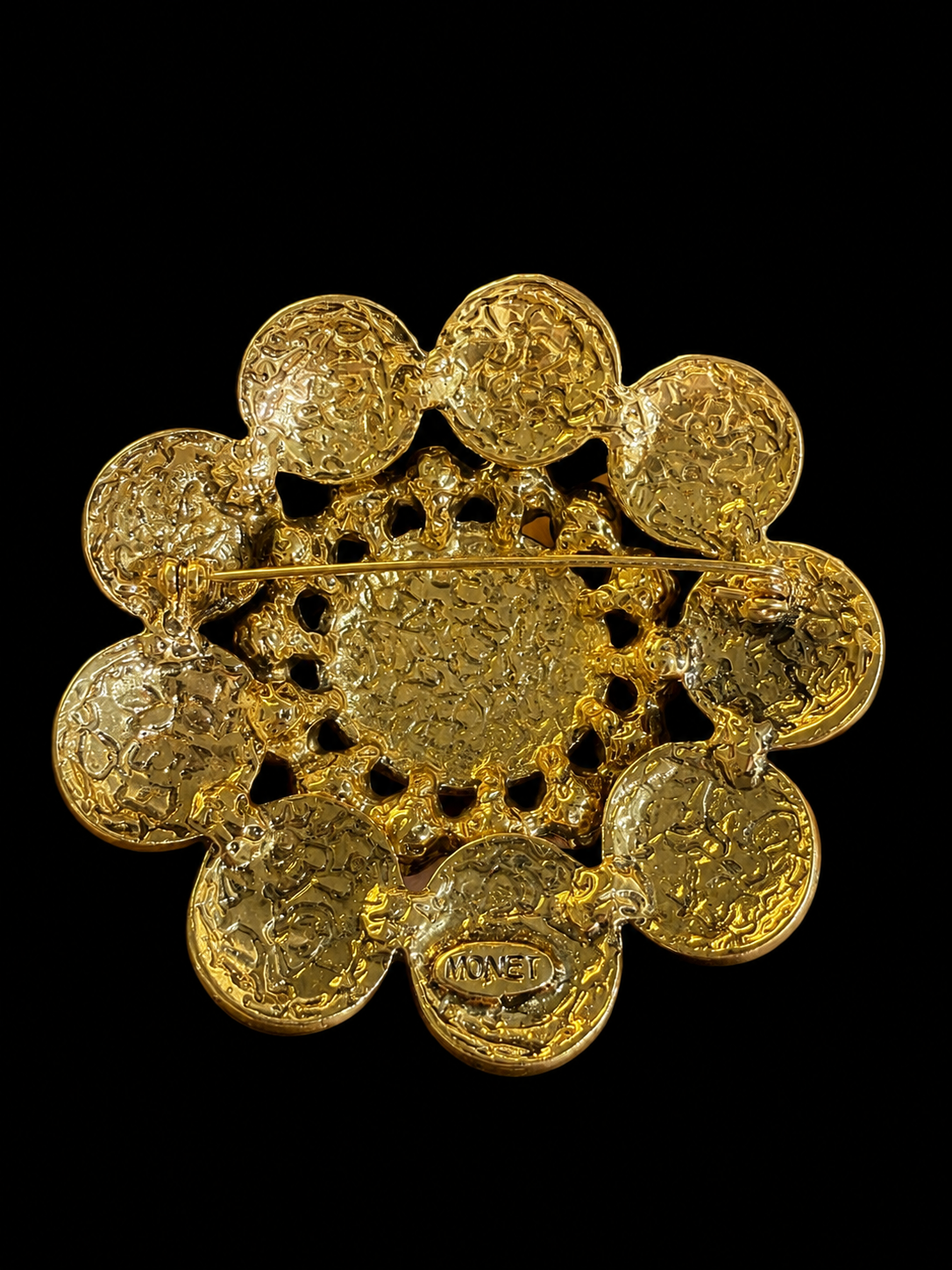 Gold-tone red and blue resin-style floral statement brooch back view with pin clasp