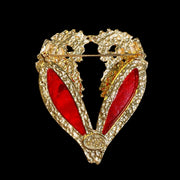 Gold-tone red crystal-style winged heart statement brooch back pin view