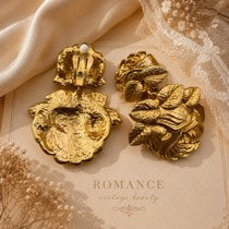 Gold-tone rose relief clip-on earrings alternate view