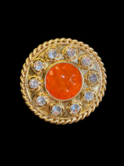 Gold-tone round orange yellow cabochon-style crystal-style brooch pendant front view