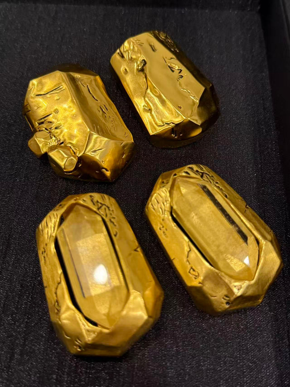 Two-pair gold-tone sculptural geometric statement clip-on earrings bundle