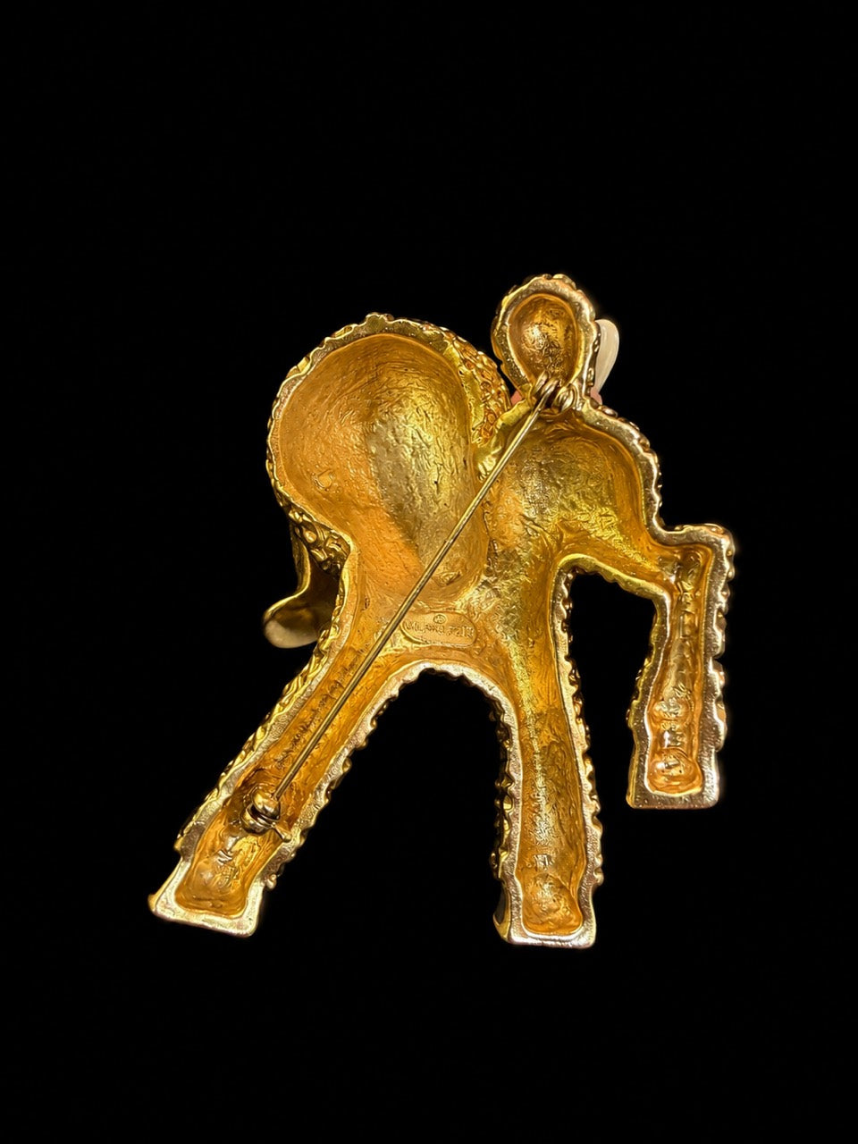 Gold-tone textured lamb statement brooch back view with pin hardware