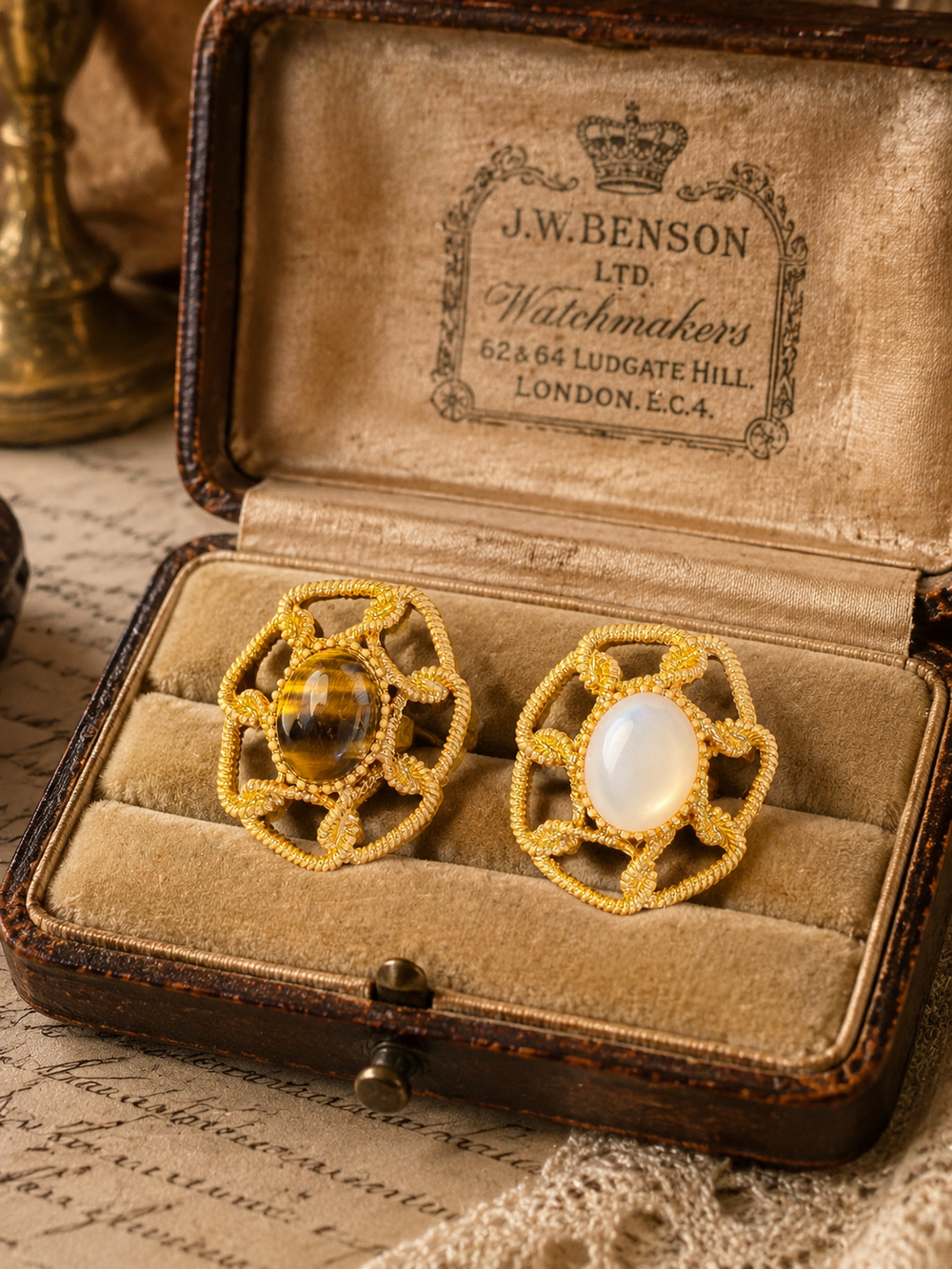 Gold-tone tiger eye-style and cat eye-style large adjustable open rings front view