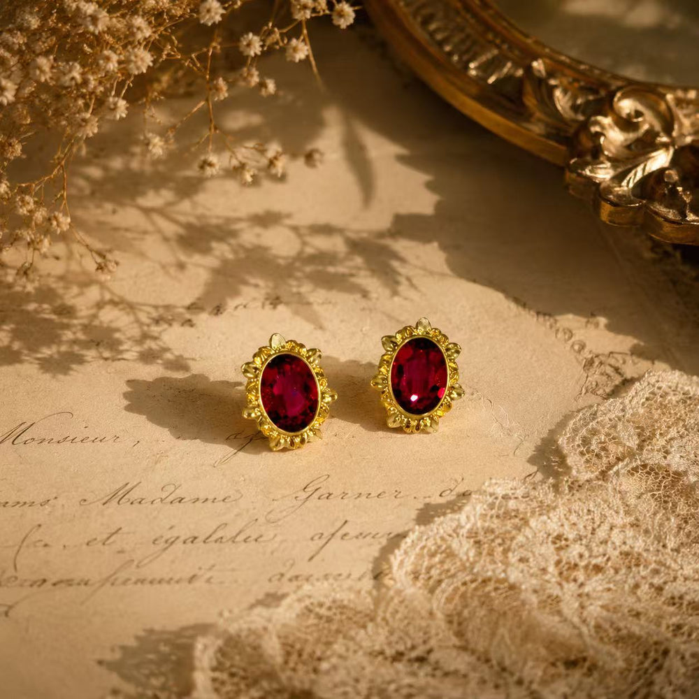 Gold-tone vivid pink oval floral stud earrings detail view