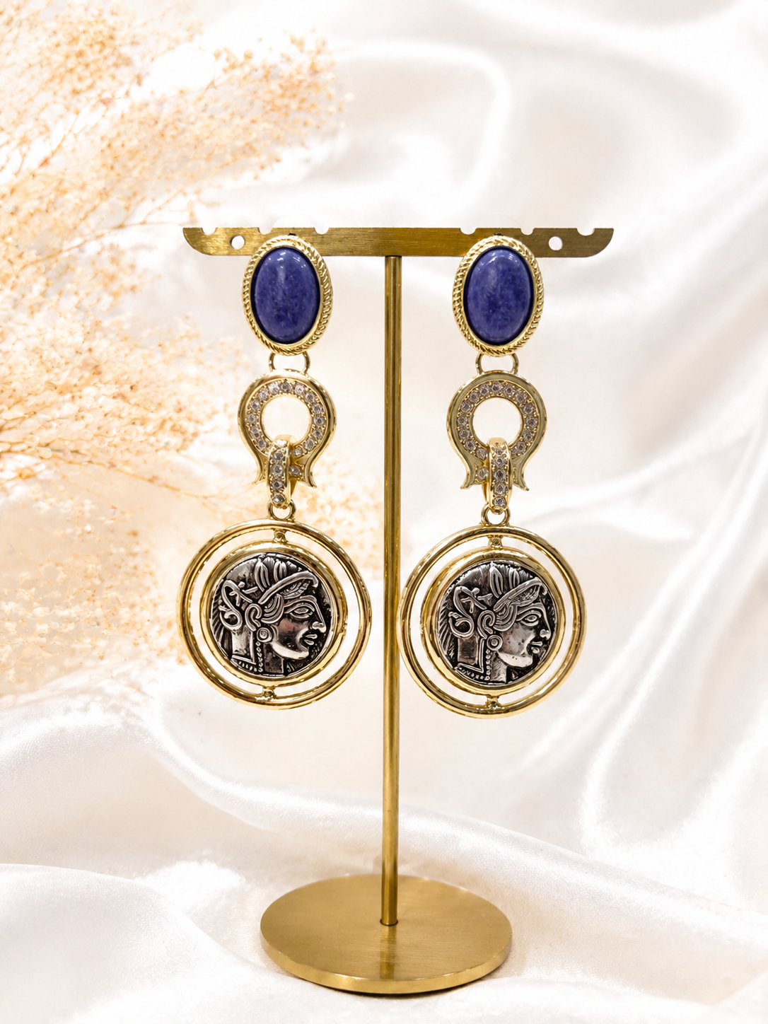 Gold-tone long coin-style blue stone drop earrings display view