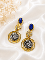 Gold-tone long coin-style blue stone drop earrings front view