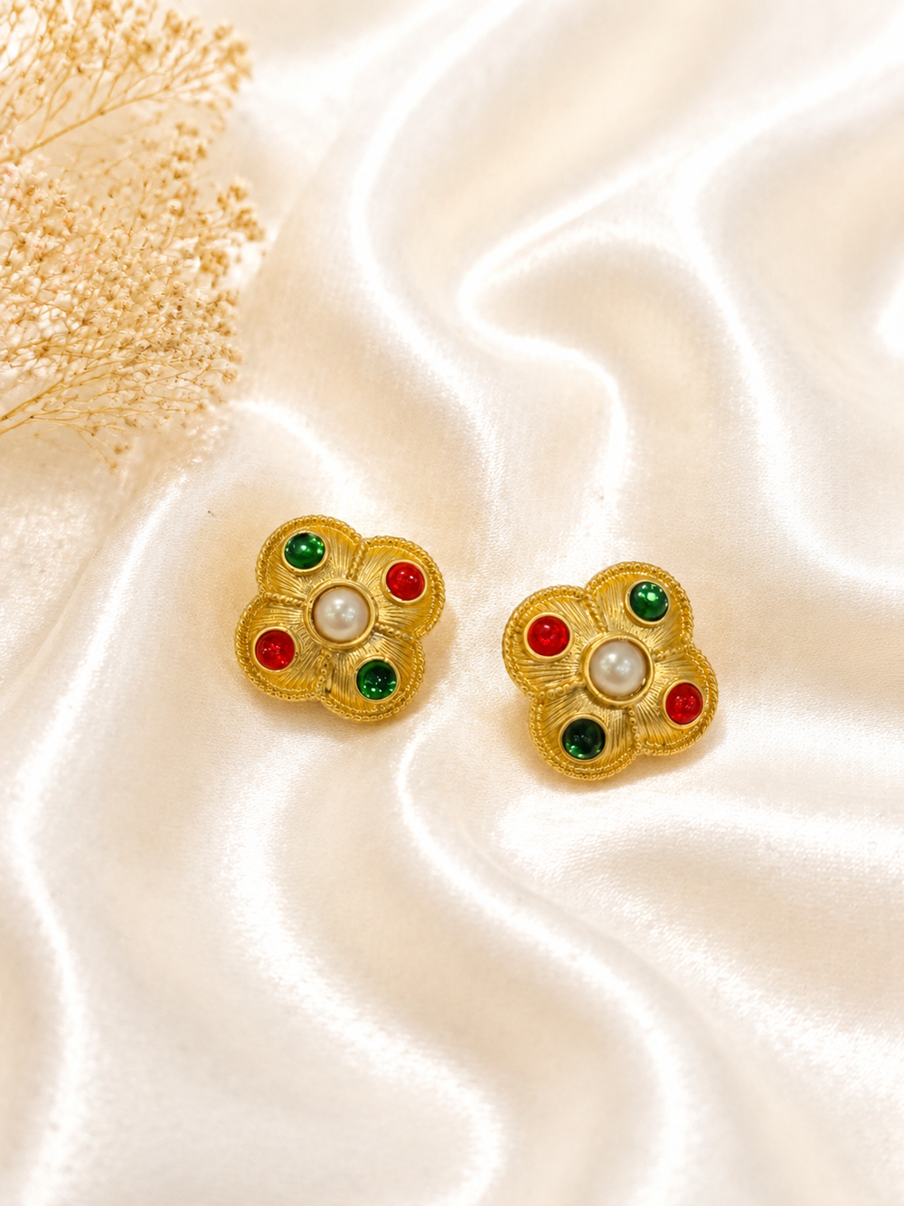 Gold-tone multicolor flower earrings with white pearl-style center and red and green accents