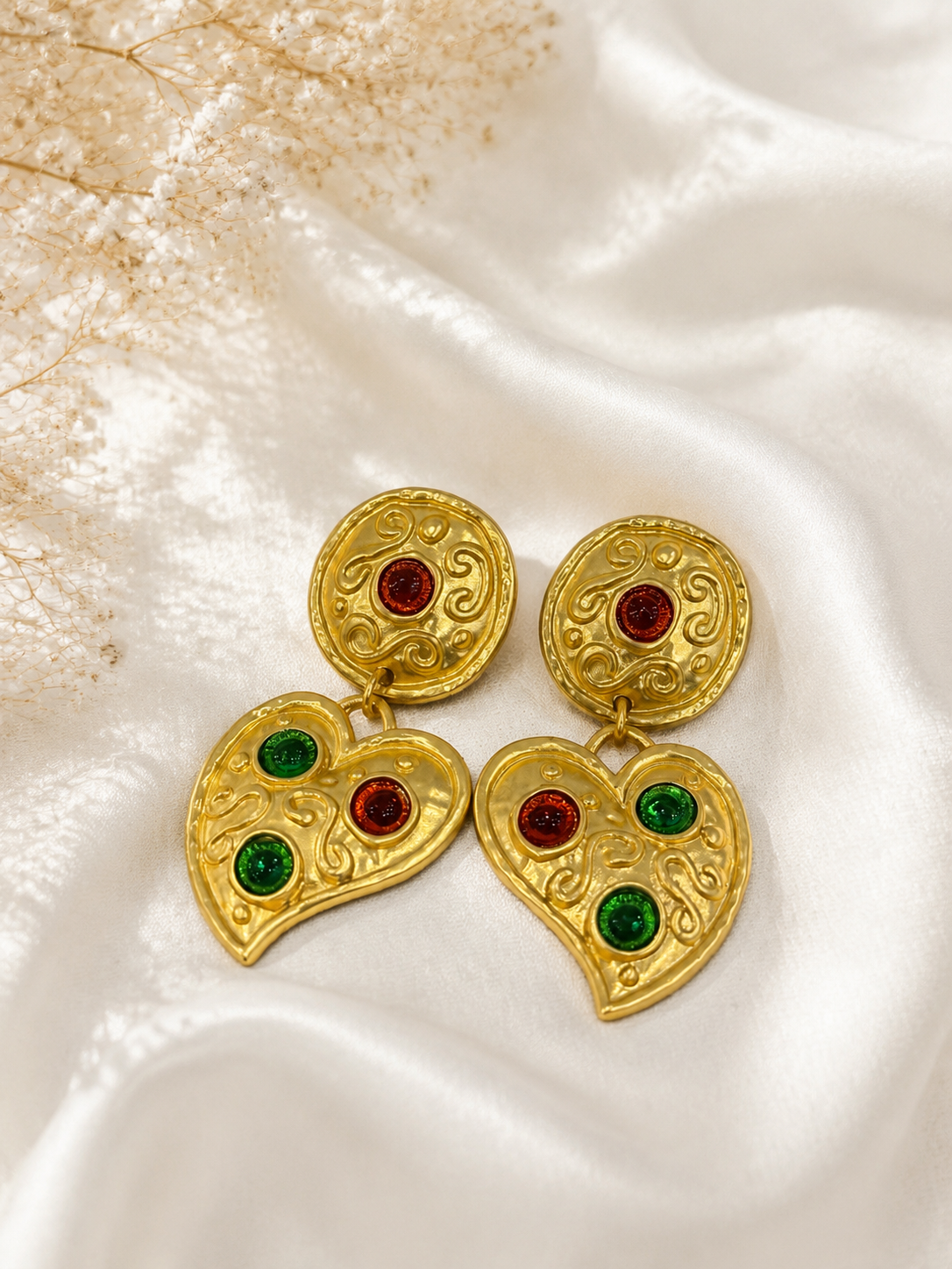 Gold-tone multicolor heart drop stud earrings close-up view