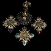 Ornate coin-inspired brooch pendants in three color styles, group view