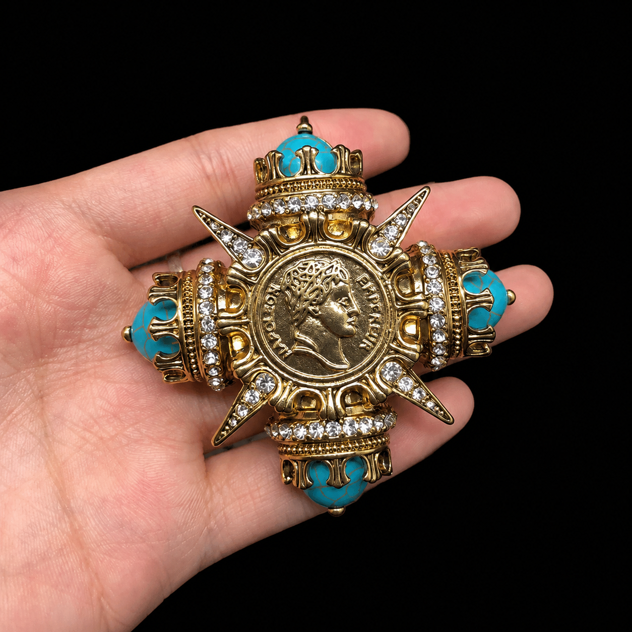 Coin-inspired brooch pendant with turquoise-style accents, detail view