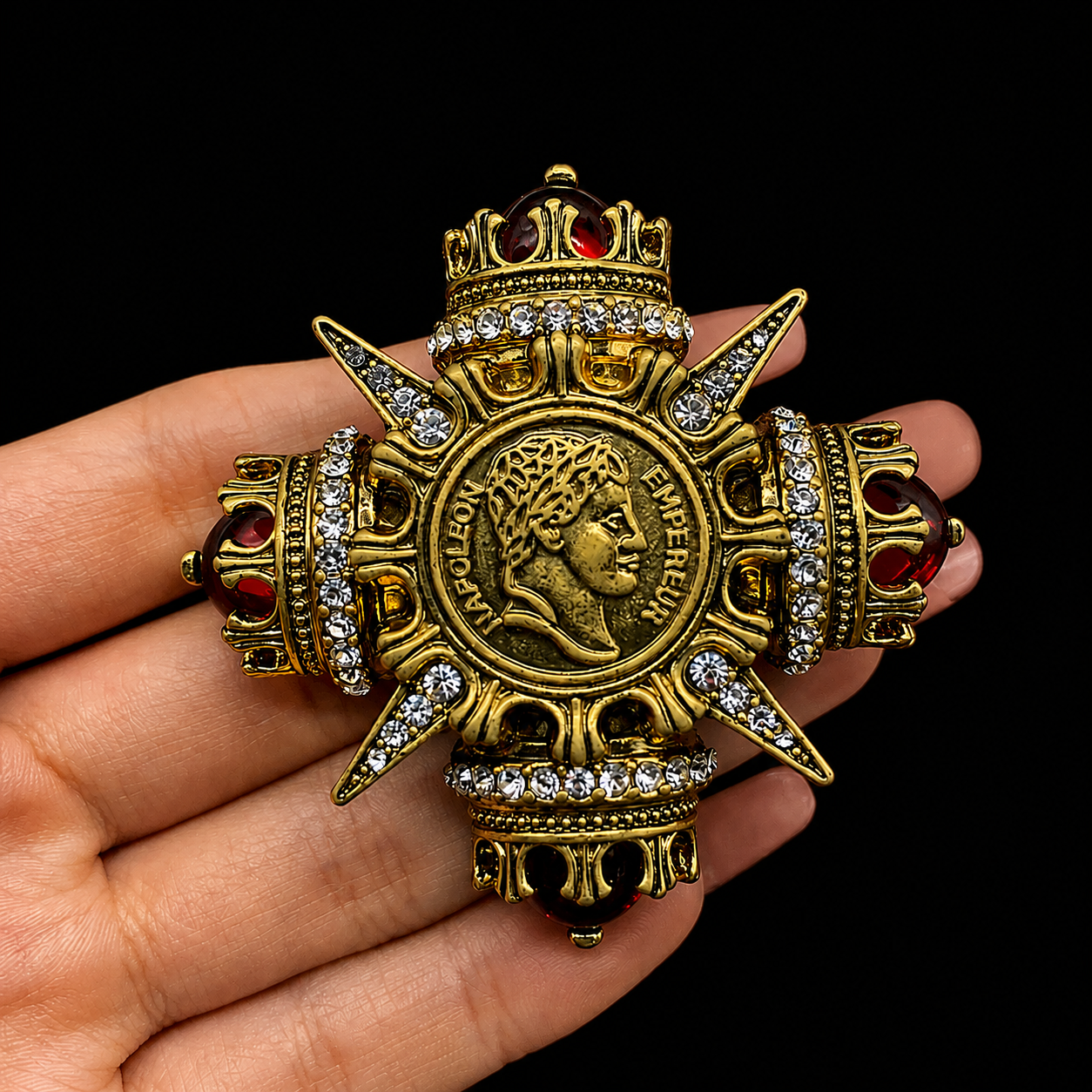 Coin-inspired brooch pendant with red-style accents, detail view