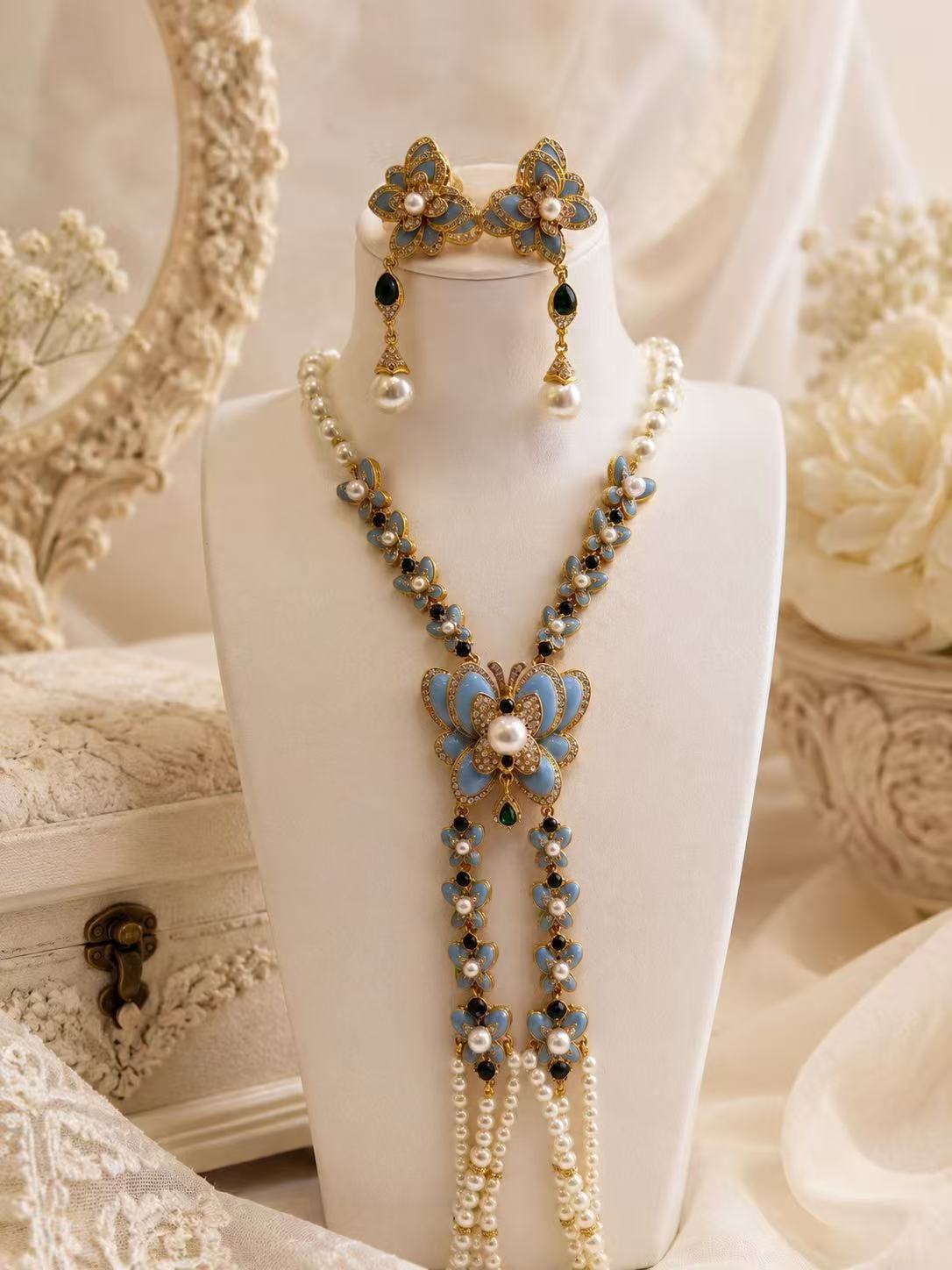 Blue butterfly enamel long necklace and stud earrings set front view
