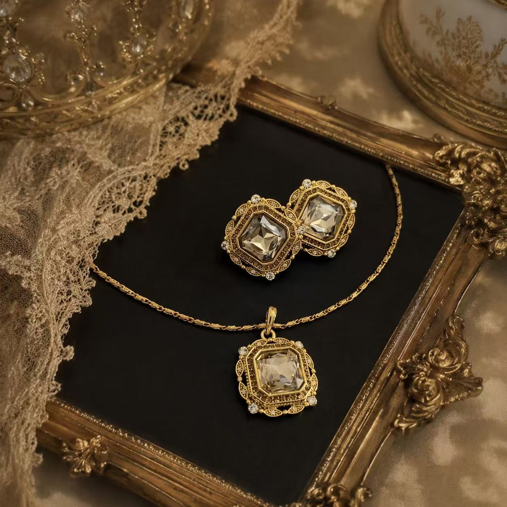 Gold-tone champagne crystal-style necklace and clip-on earrings set