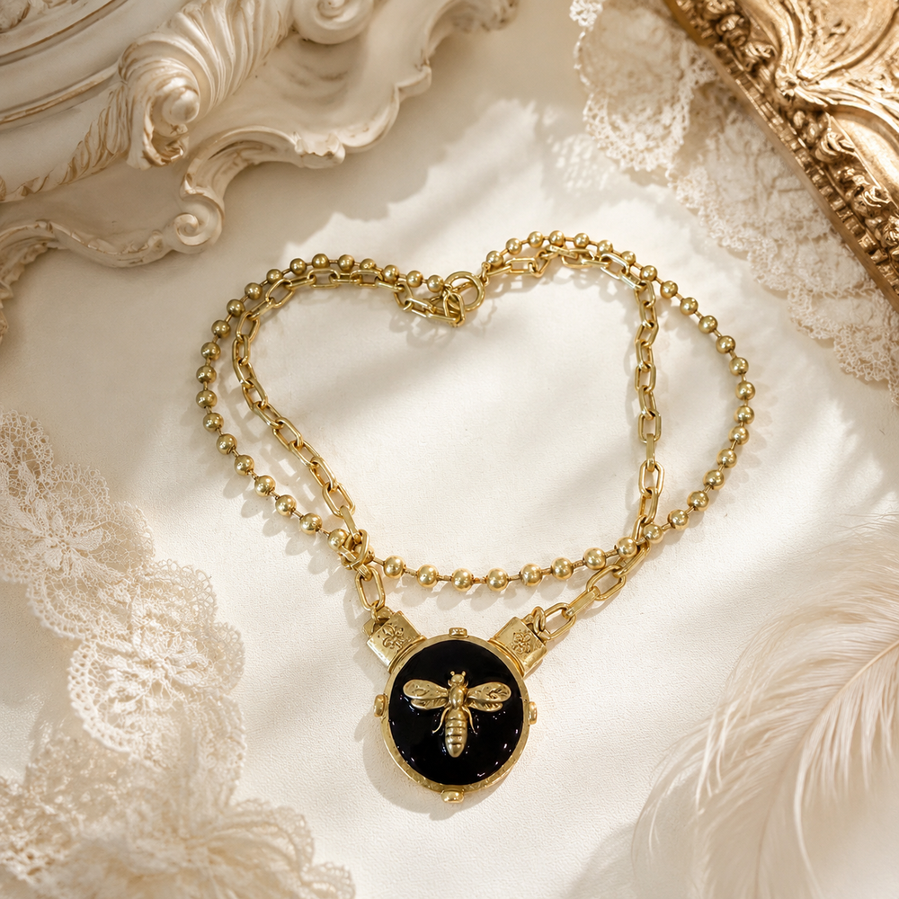 Vintage-inspired double-layer bee necklace with black enamel-style pendant