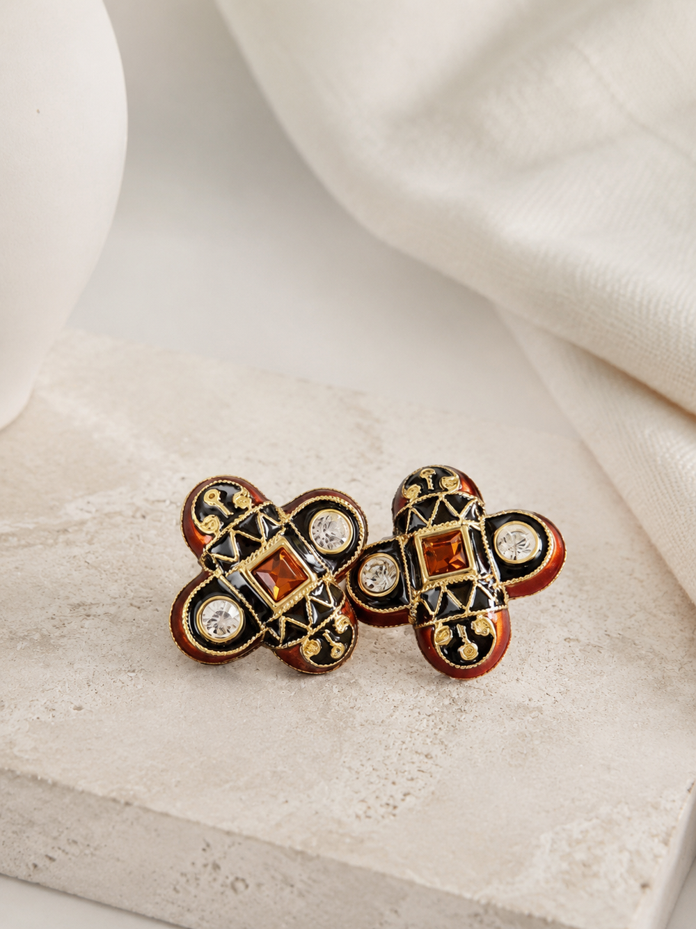 Gold-tone amber enamel-style earrings front view