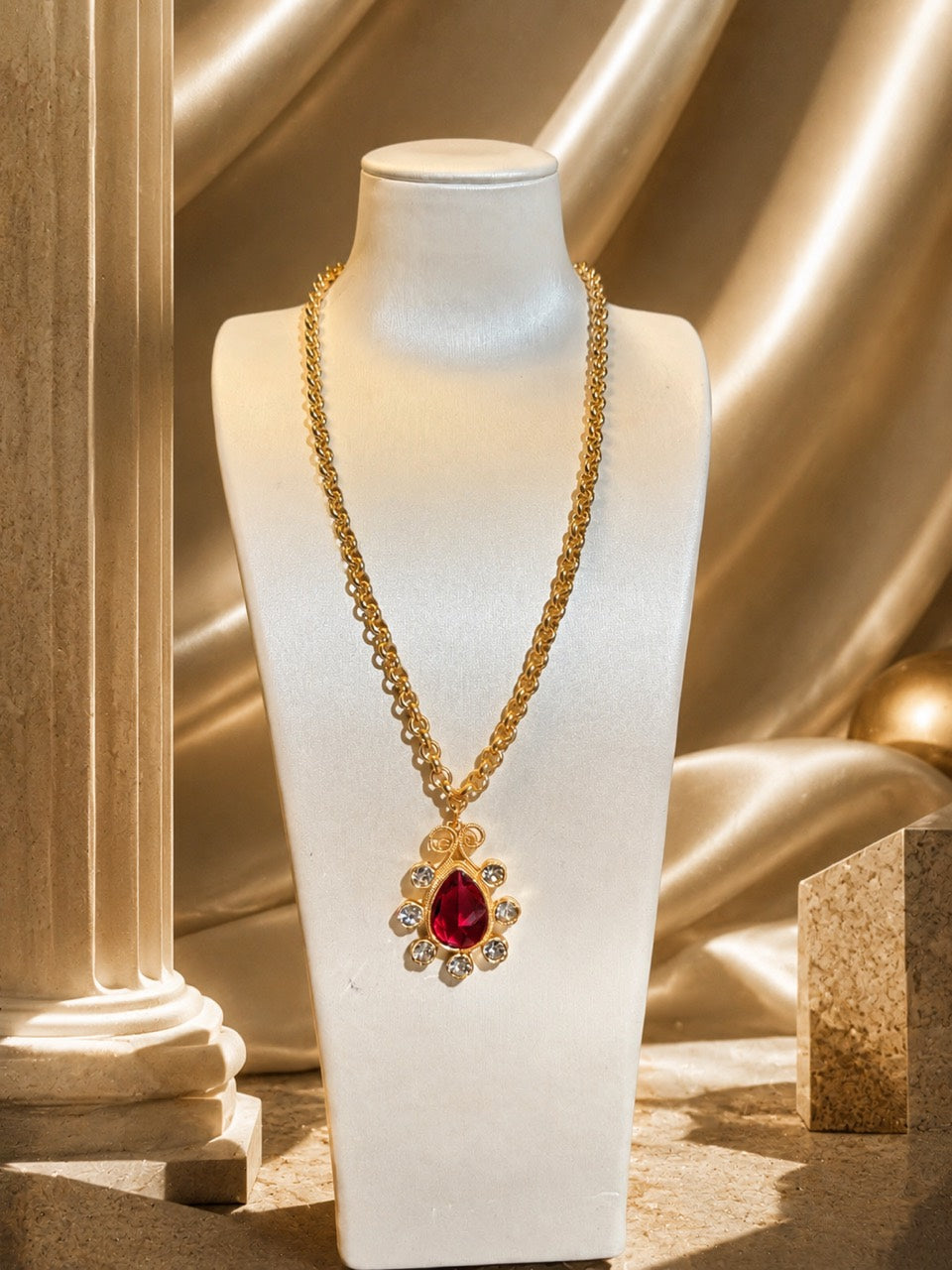 Gold-tone Barbie pink resin teardrop pendant necklace with crystal-style accents full view