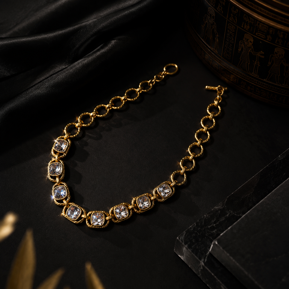 Gold-tone clear rhinestone-style chain necklace on black display view