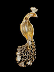 Gold-tone crystal-style peacock statement brooch back view with pin closure
