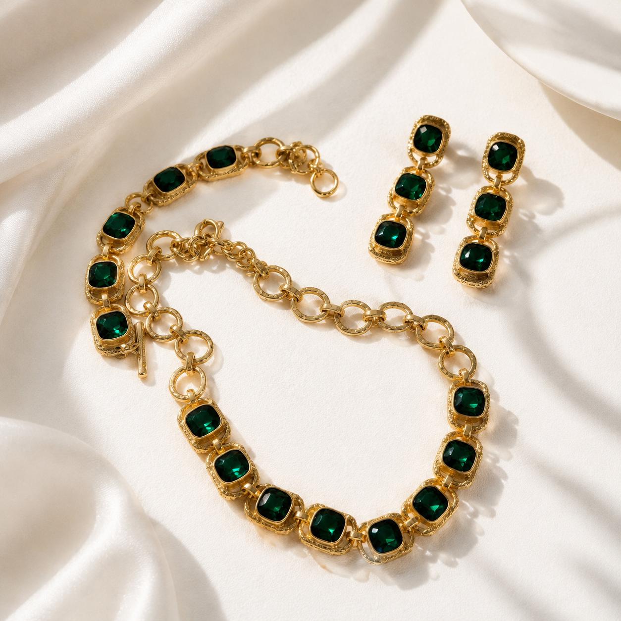 Gold-tone dark green crystal-style jewelry set detail view