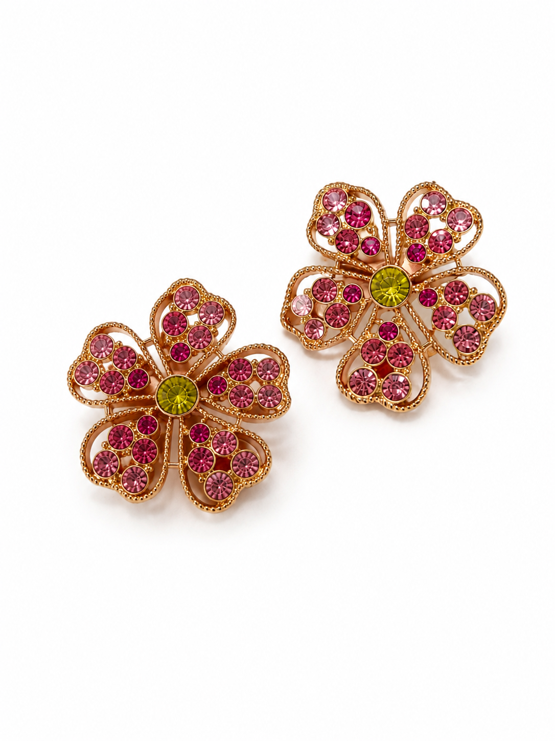 Gold-tone flower stud earrings with pink crystal-style accents