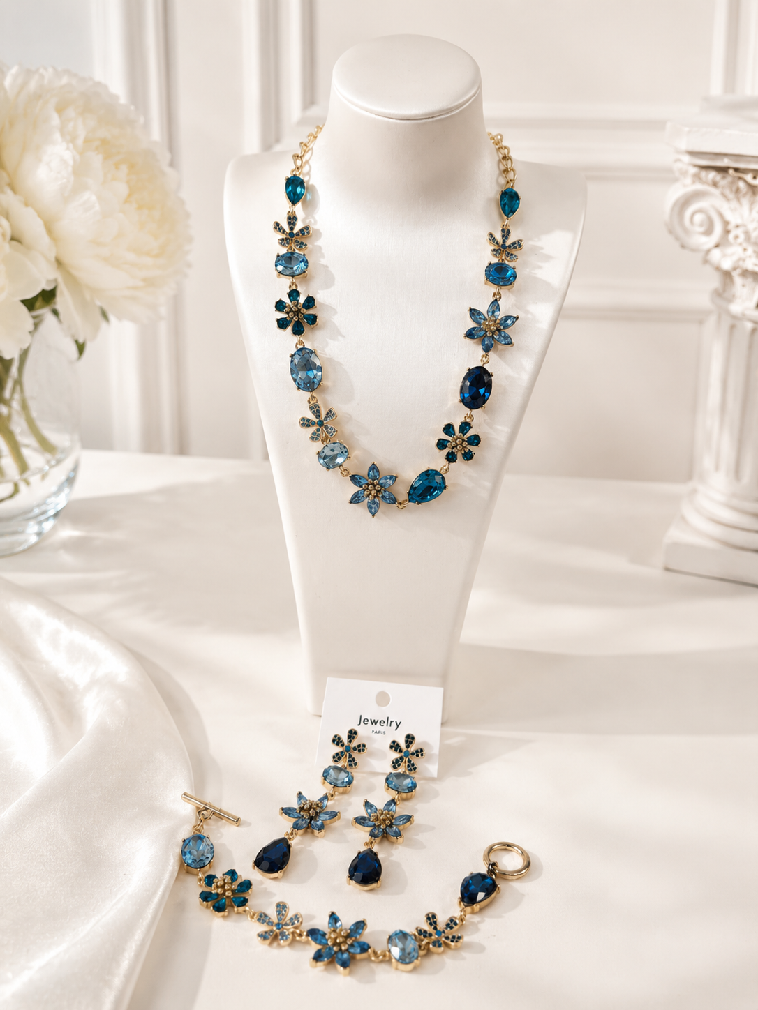 Blue gold-tone glass flower and teardrop necklace bracelet and stud earrings set